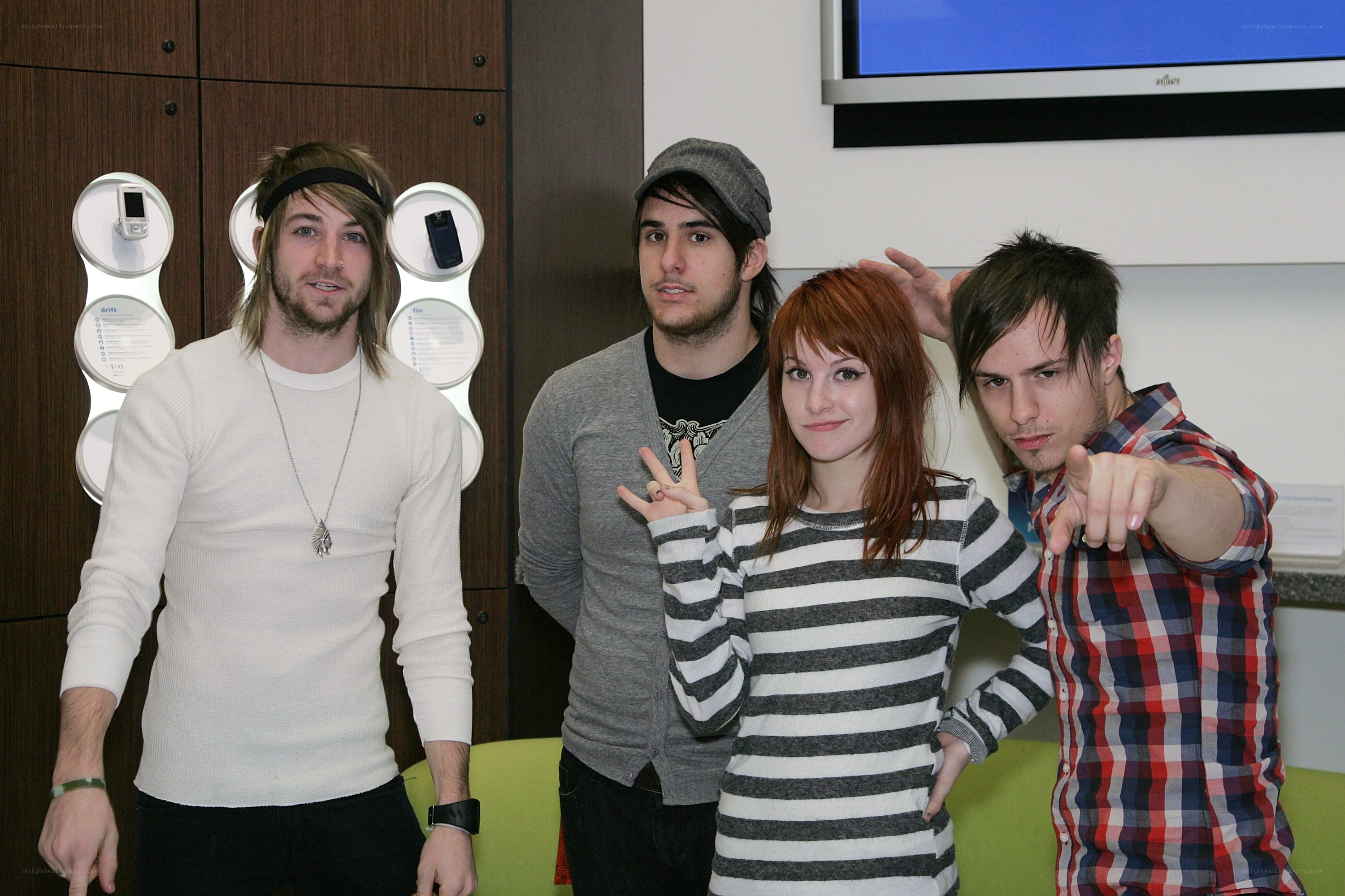 band members posing together
