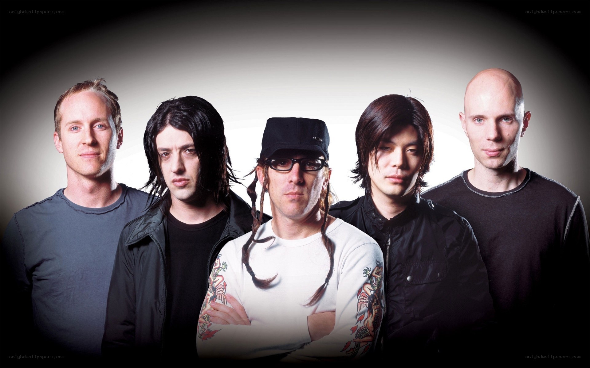 band members posing together