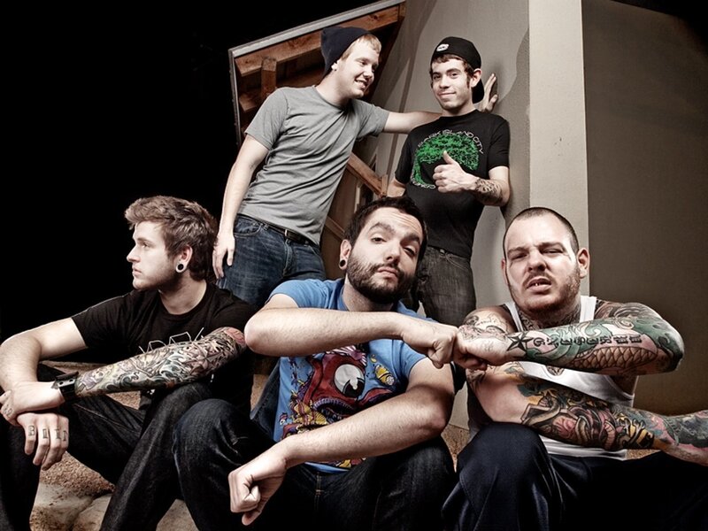 band members posing together