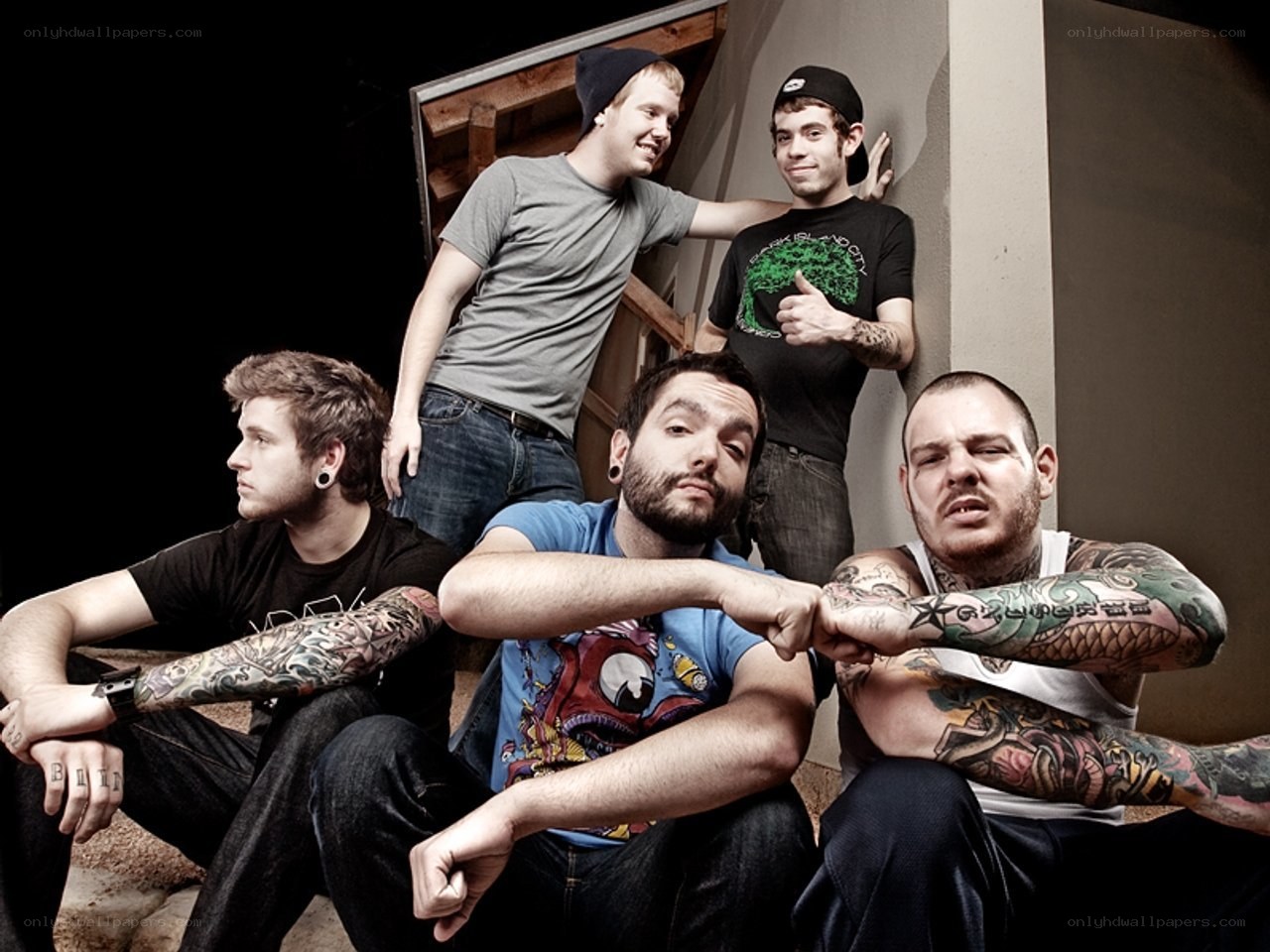 band members posing together