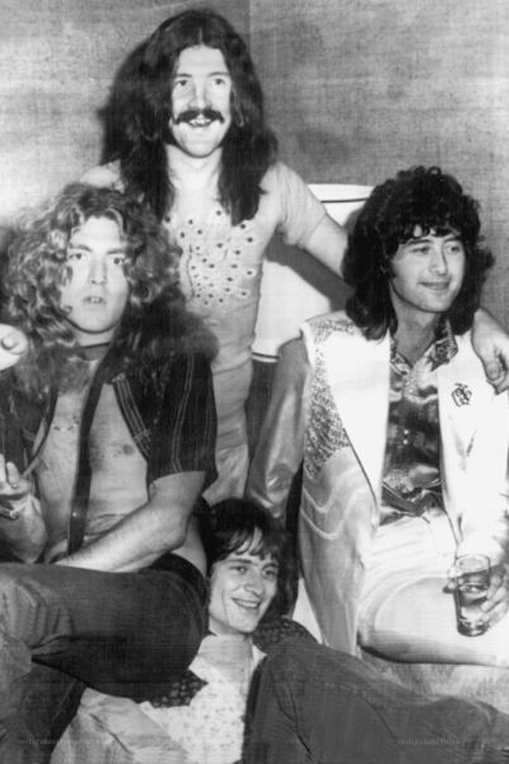 band members posing together