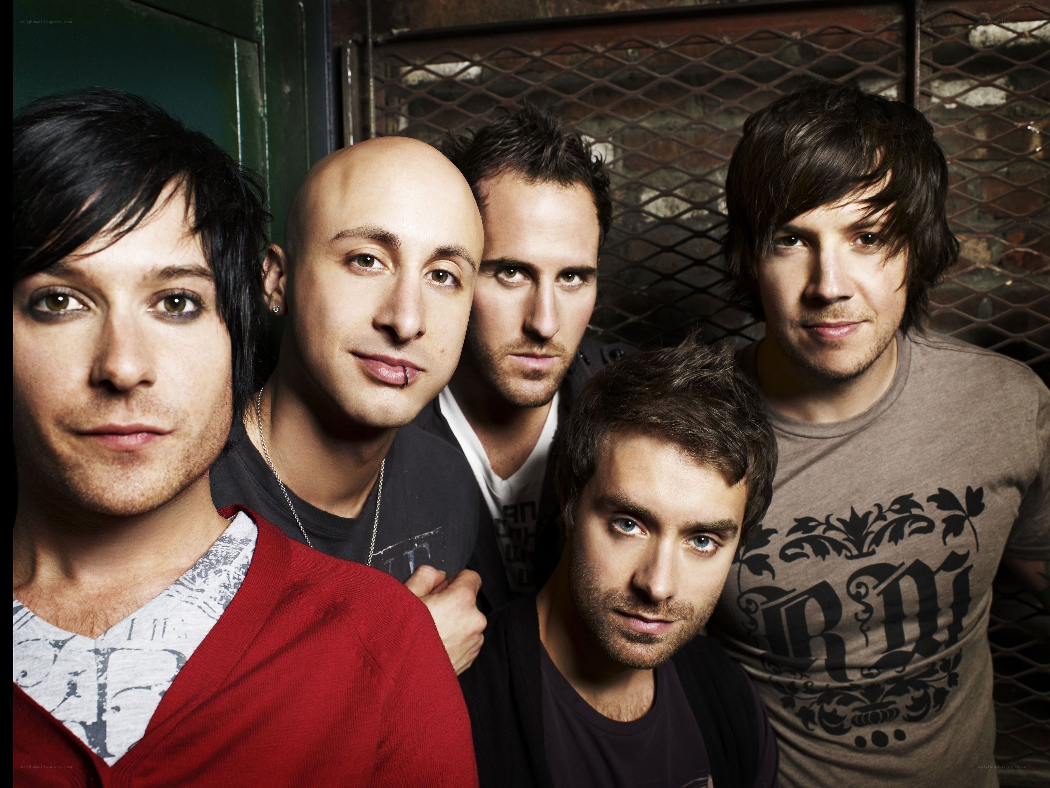 band members posing together