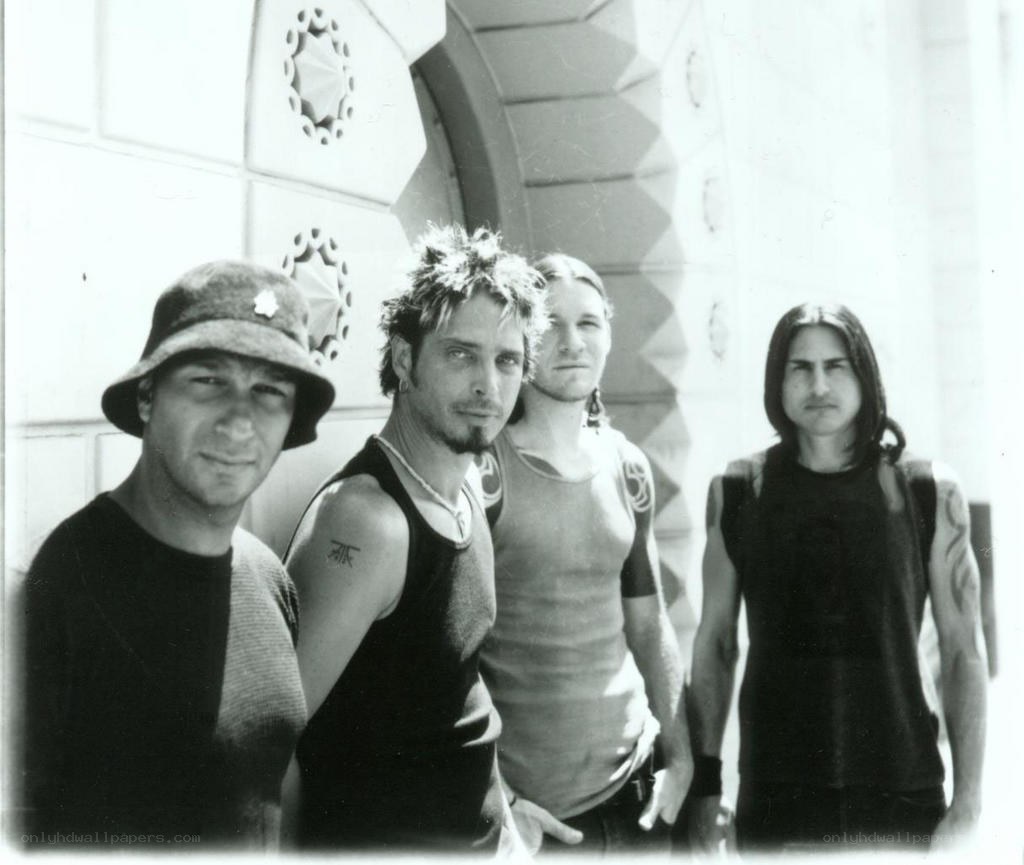 band members posing together