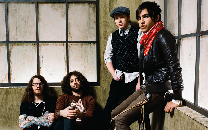 band members posing together