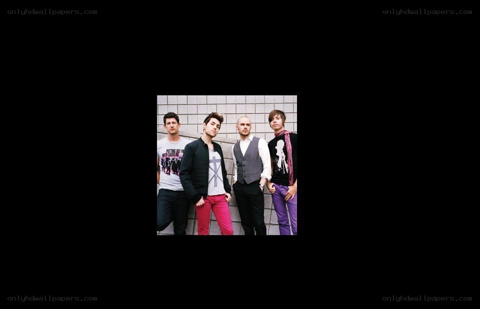 band members posing together