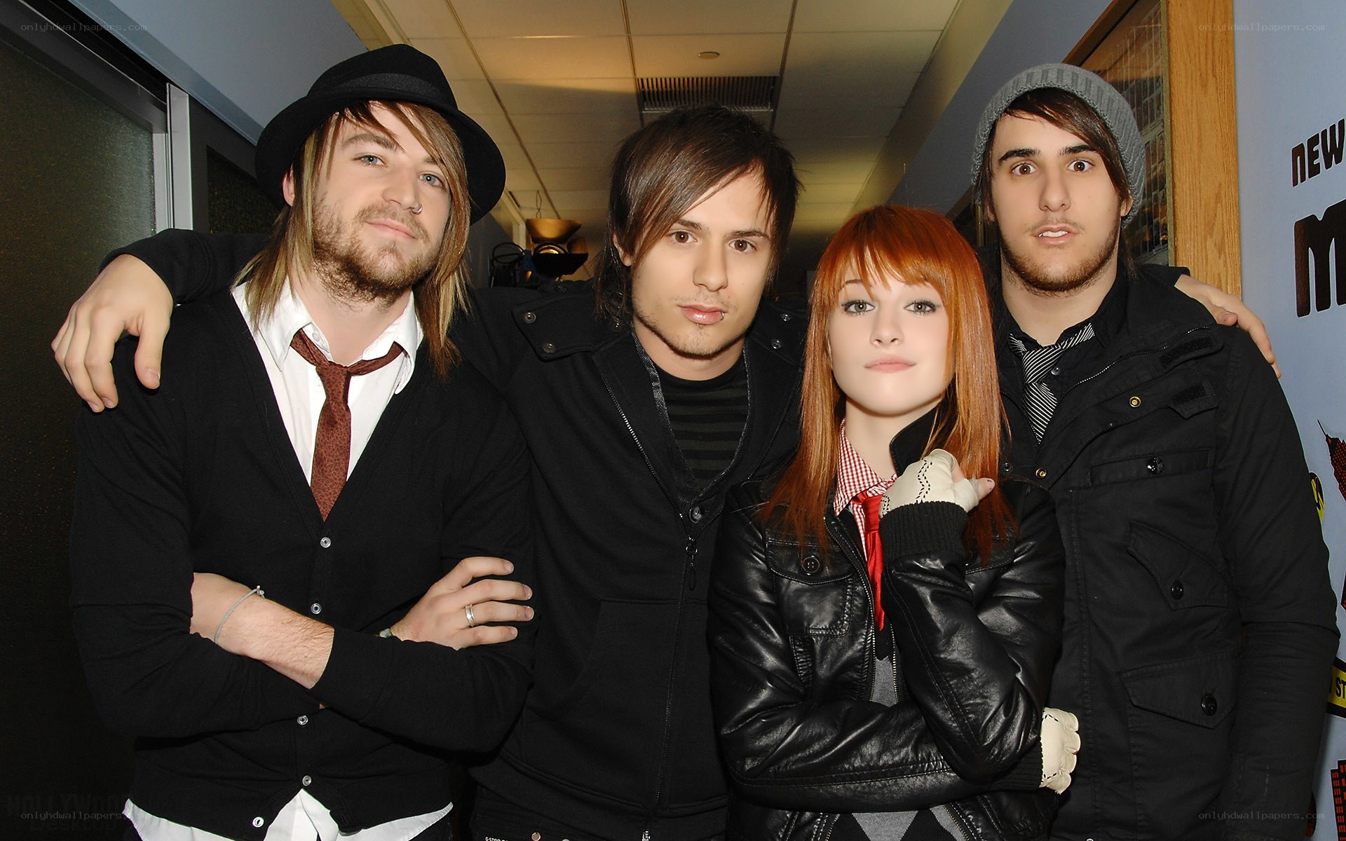 band members posing together