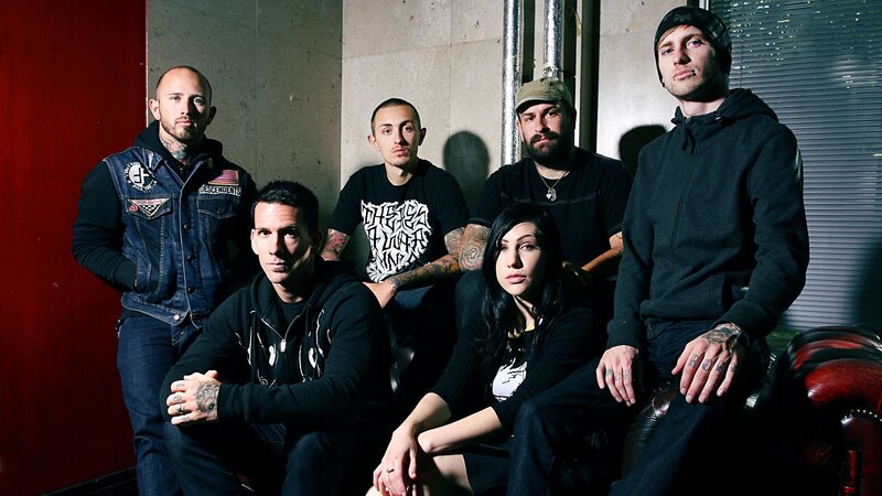band members posing together