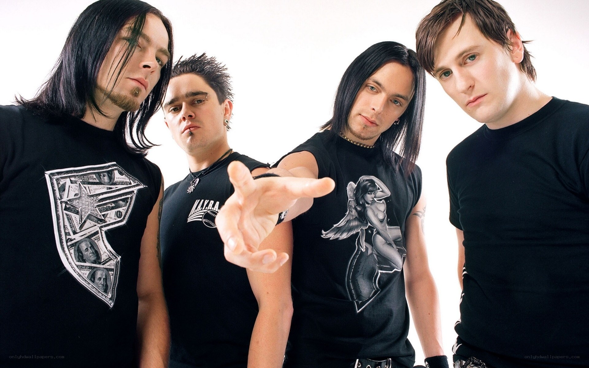 band members posing together
