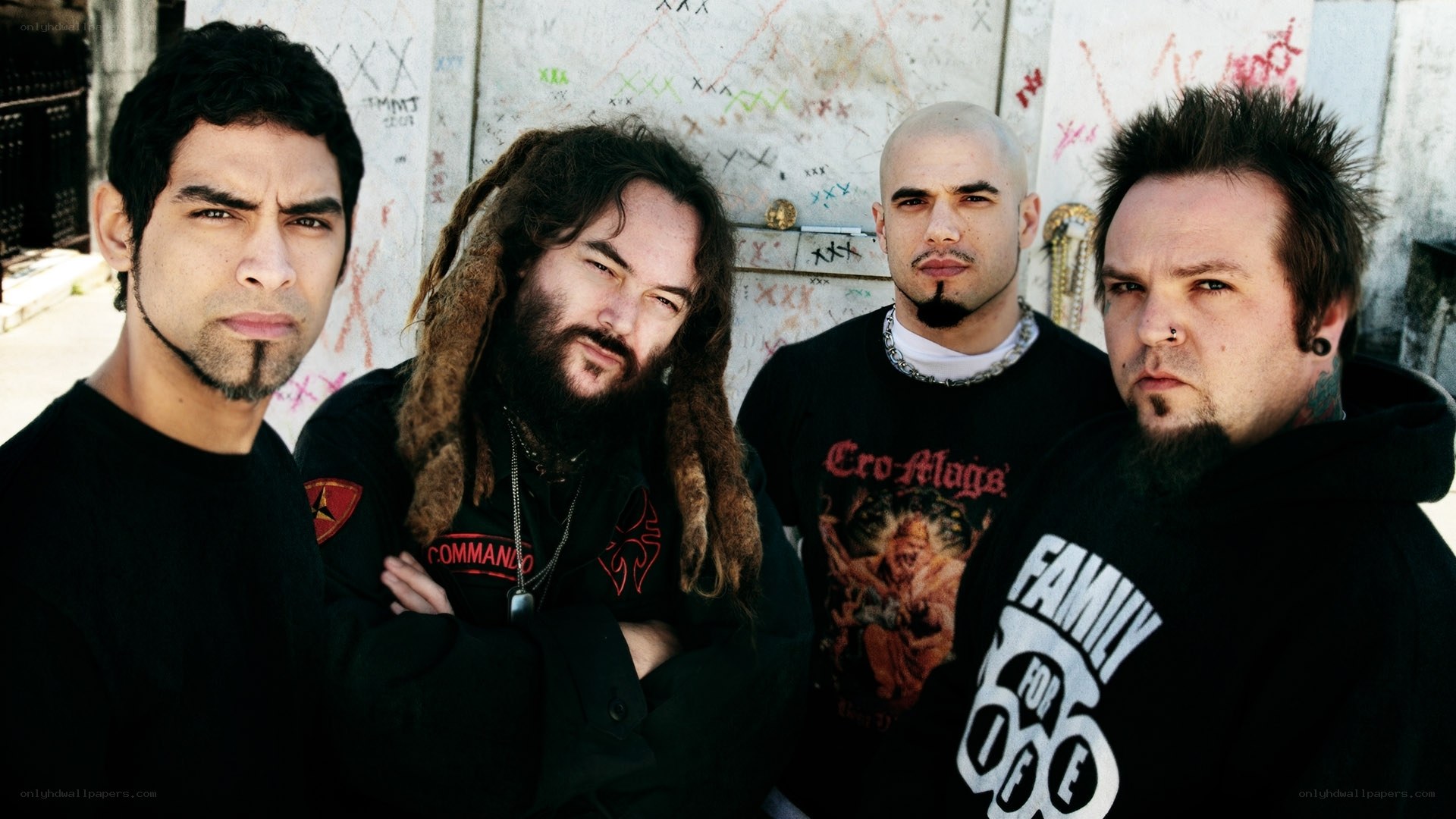 band members posing together