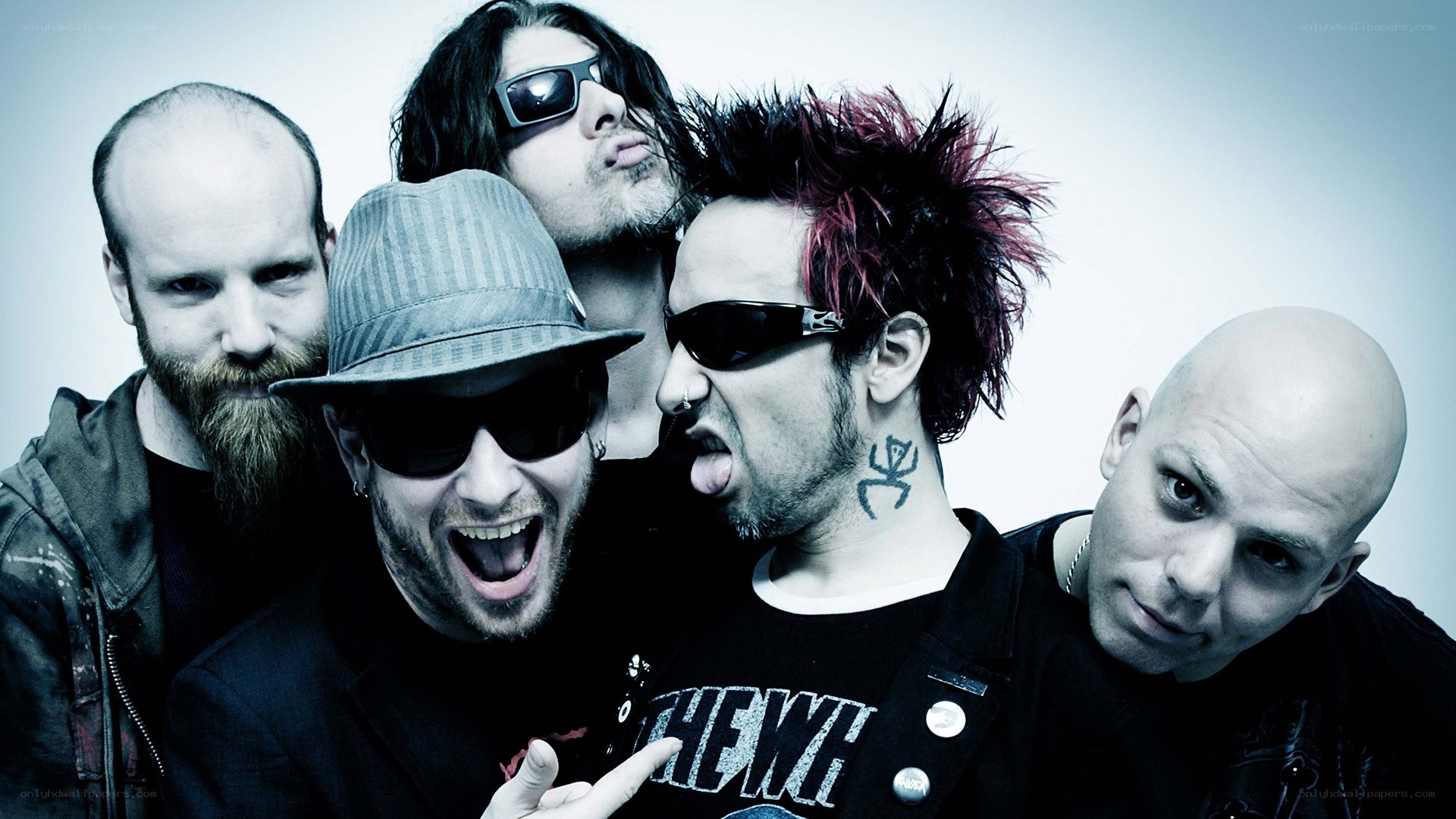 band members posing together