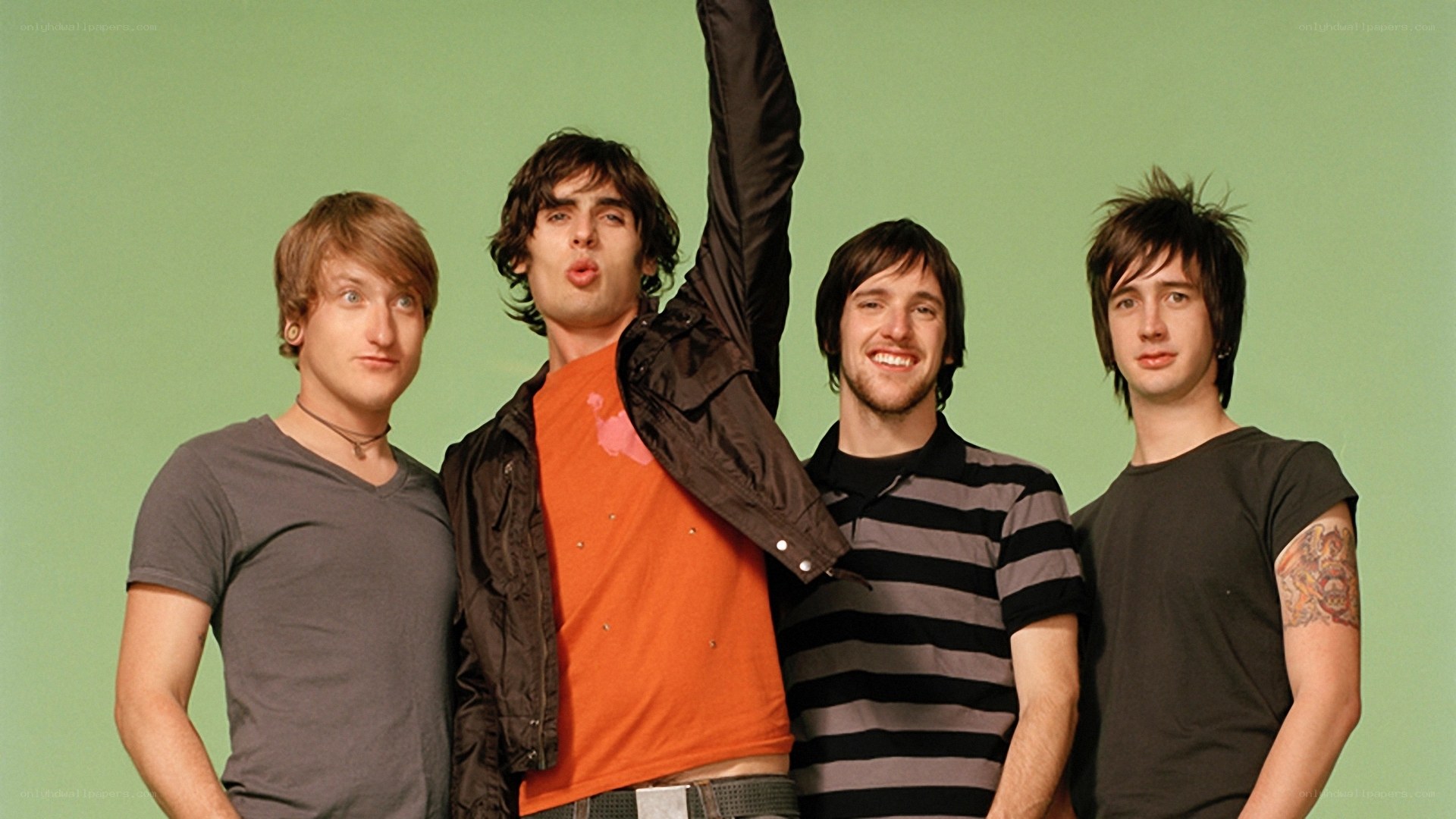 band members posing together