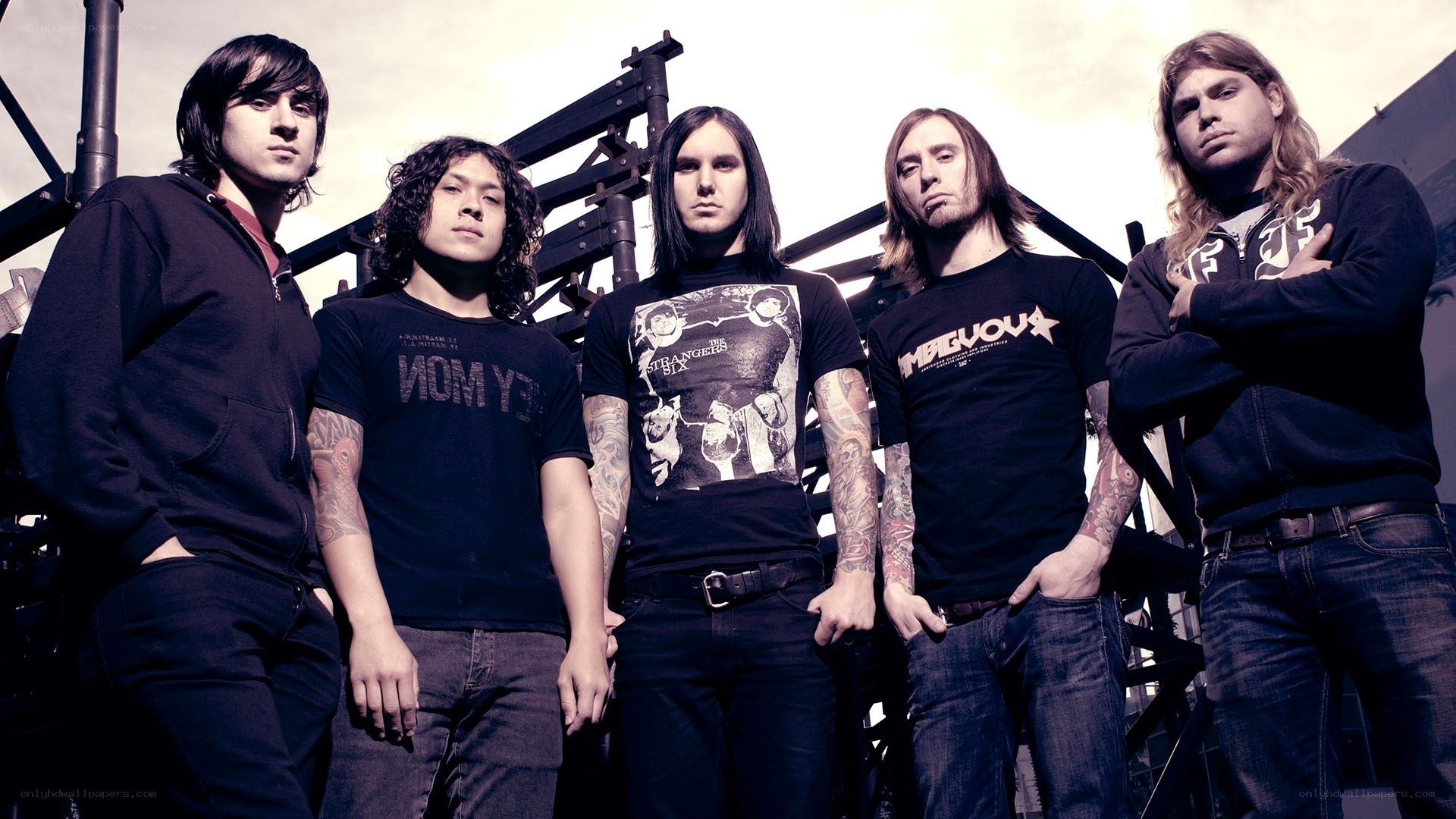 band members posing together