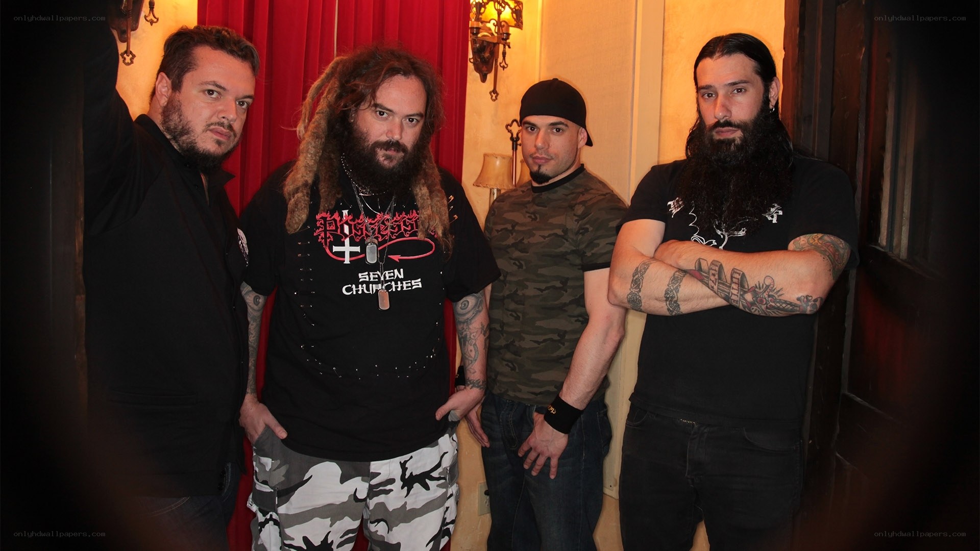 band members posing together