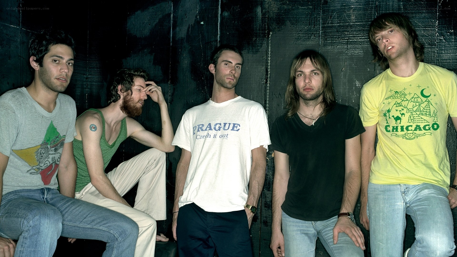 band members posing together