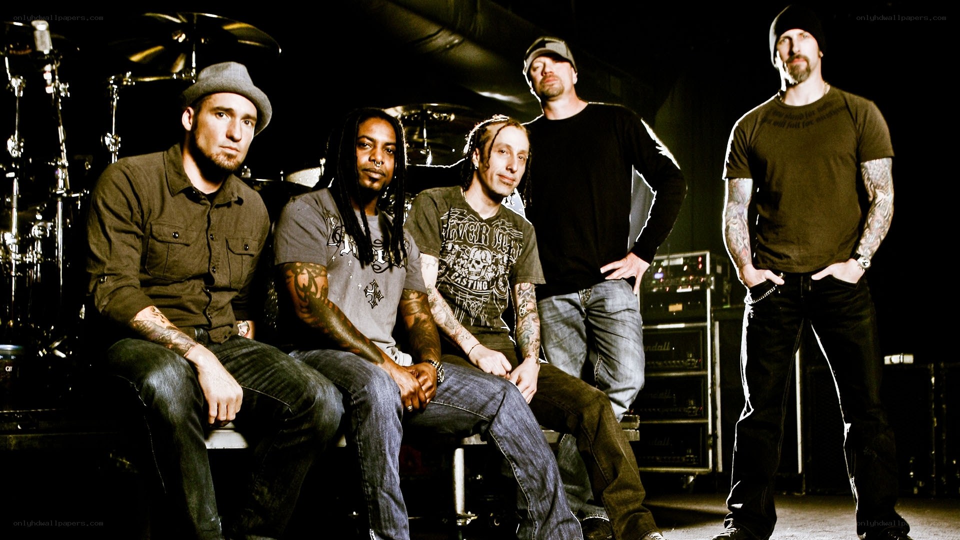 band members posing together