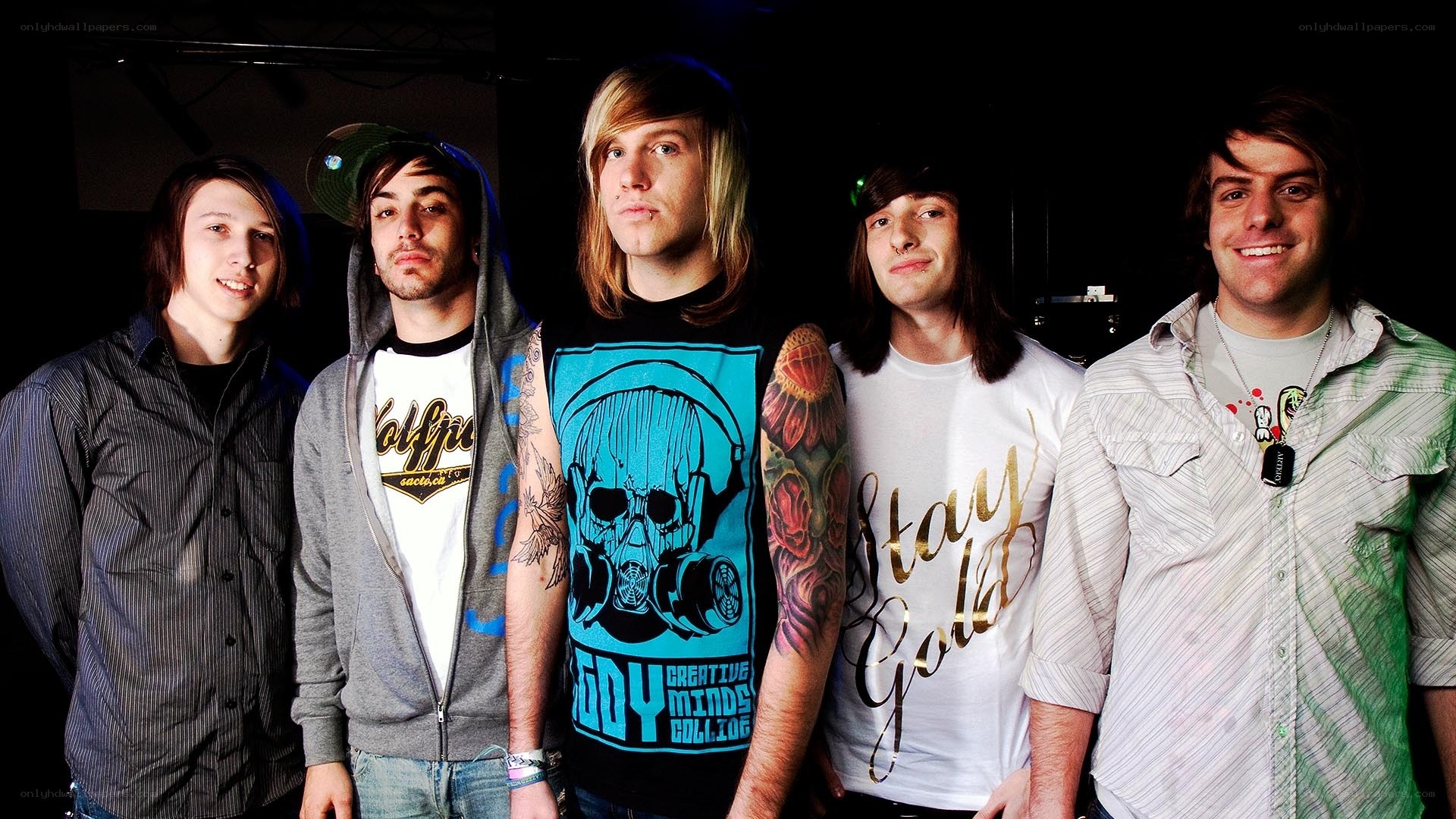 band members posing together