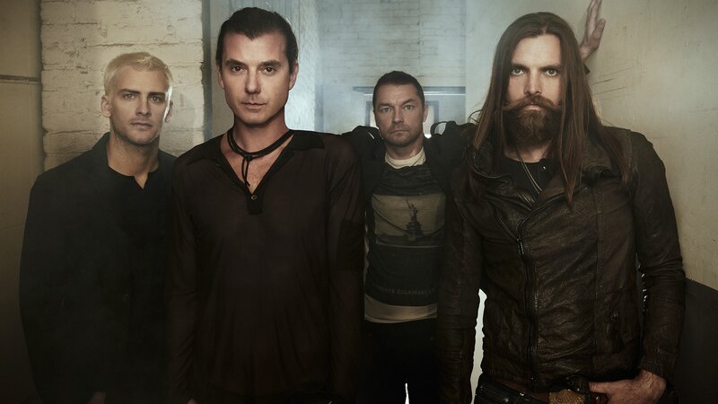 band members posing together