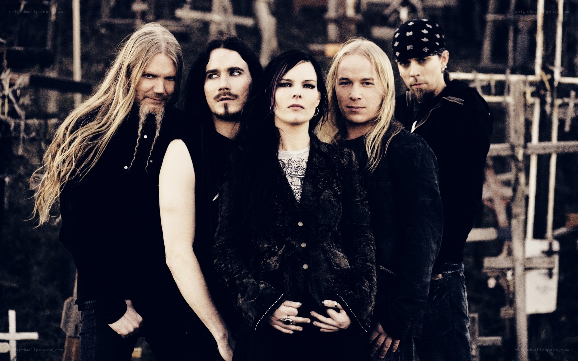 band members posing together