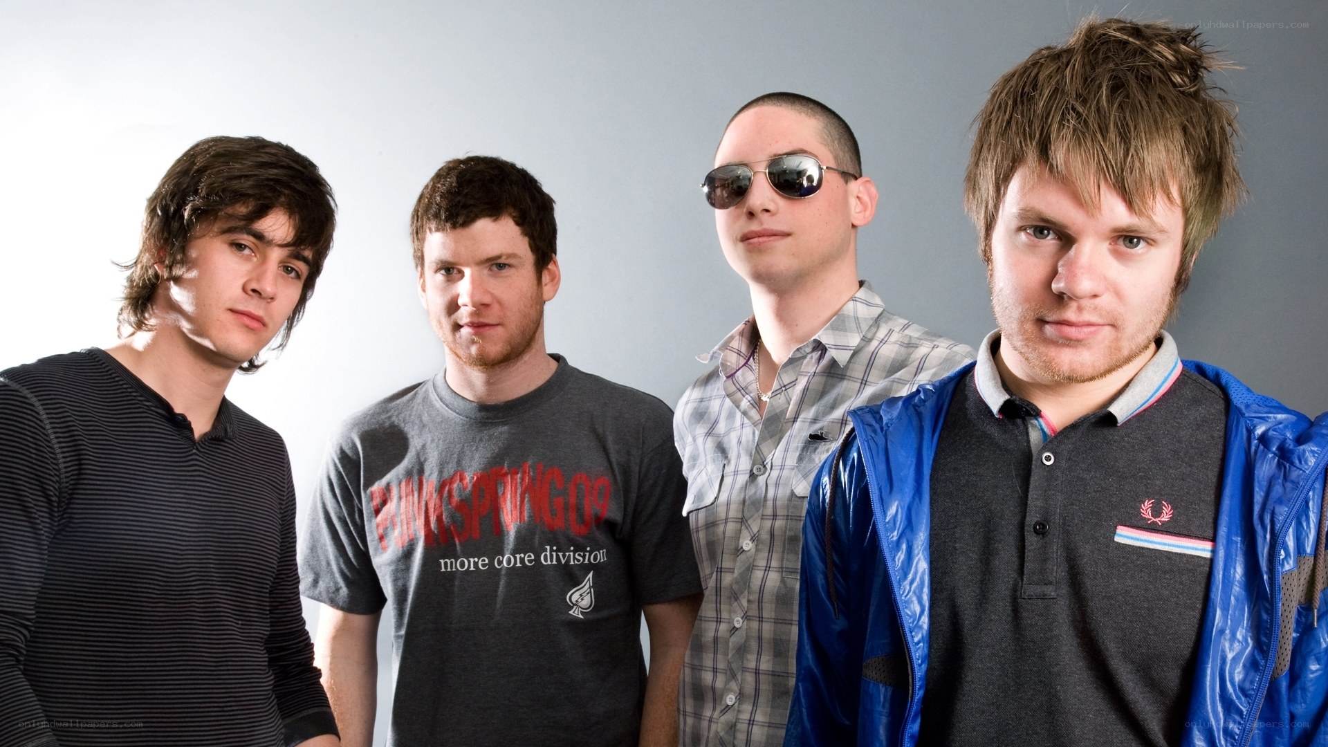 band members posing together