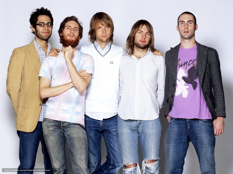 band members posing together