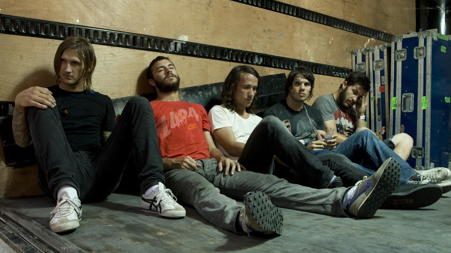 band members resting backstage