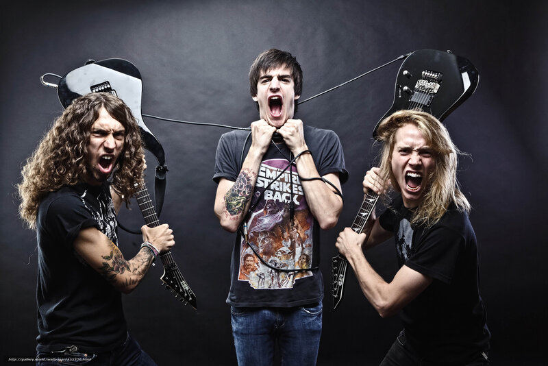 band members screaming with guitars