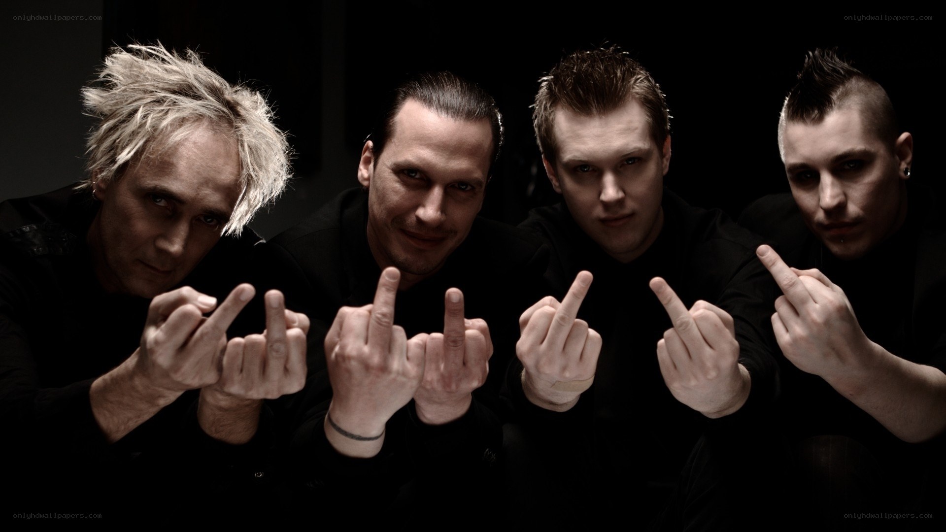 band members showing middle fingers