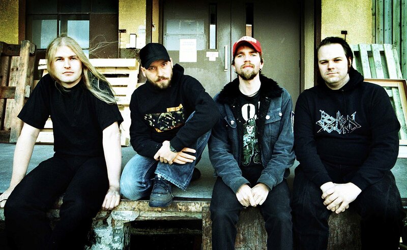 band members sitting on a bench