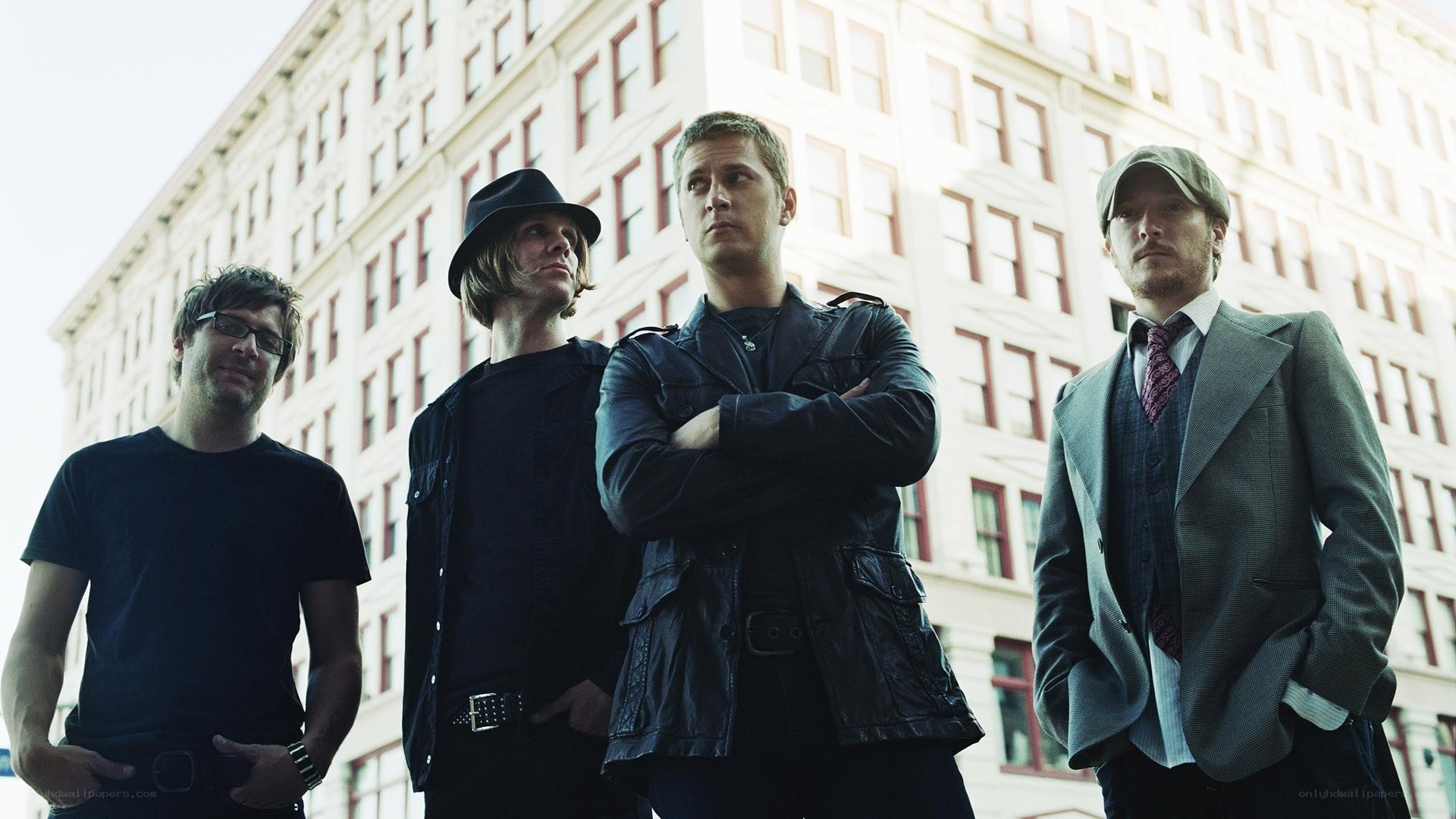 band members standing in city