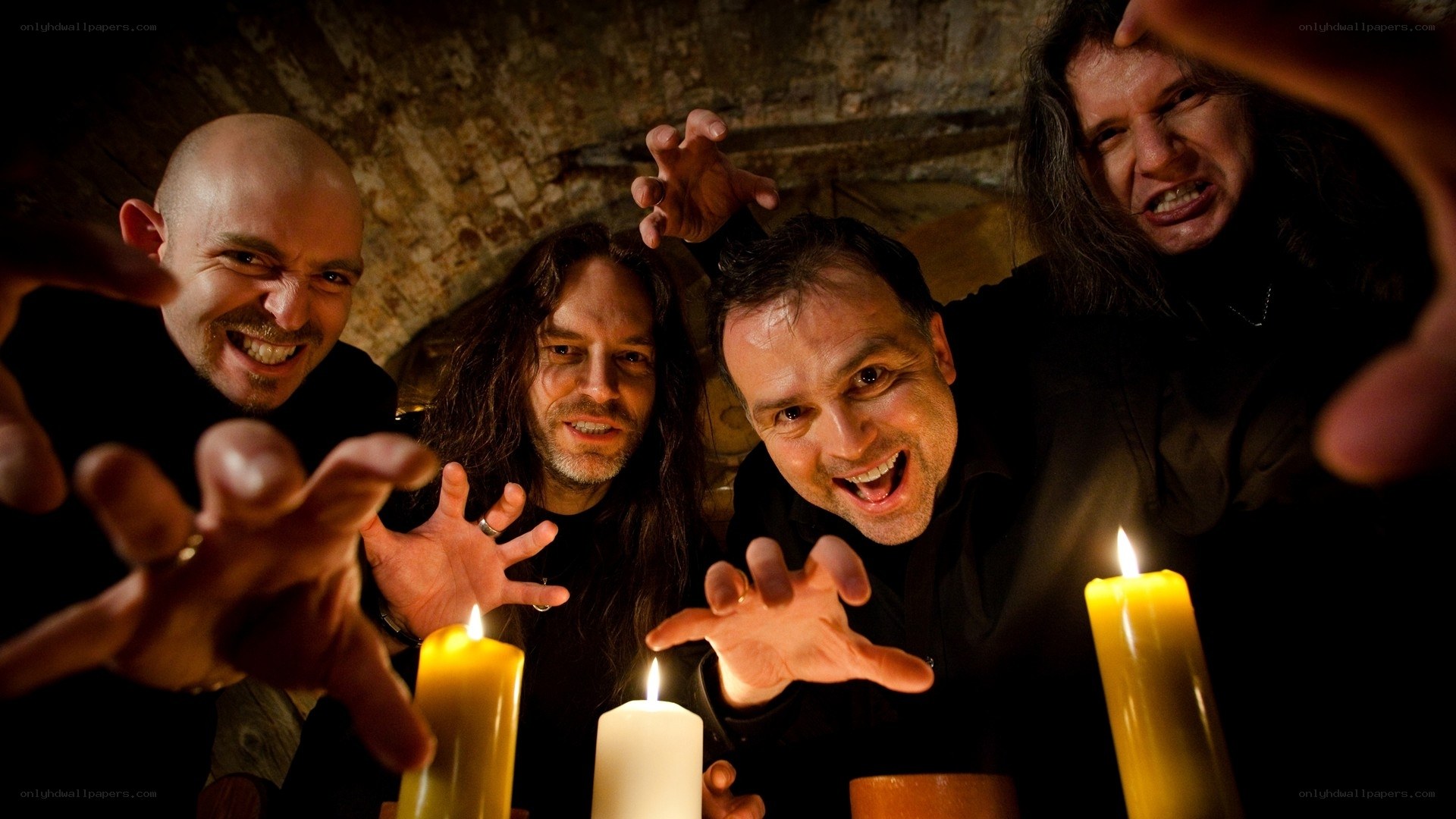 band members with candles