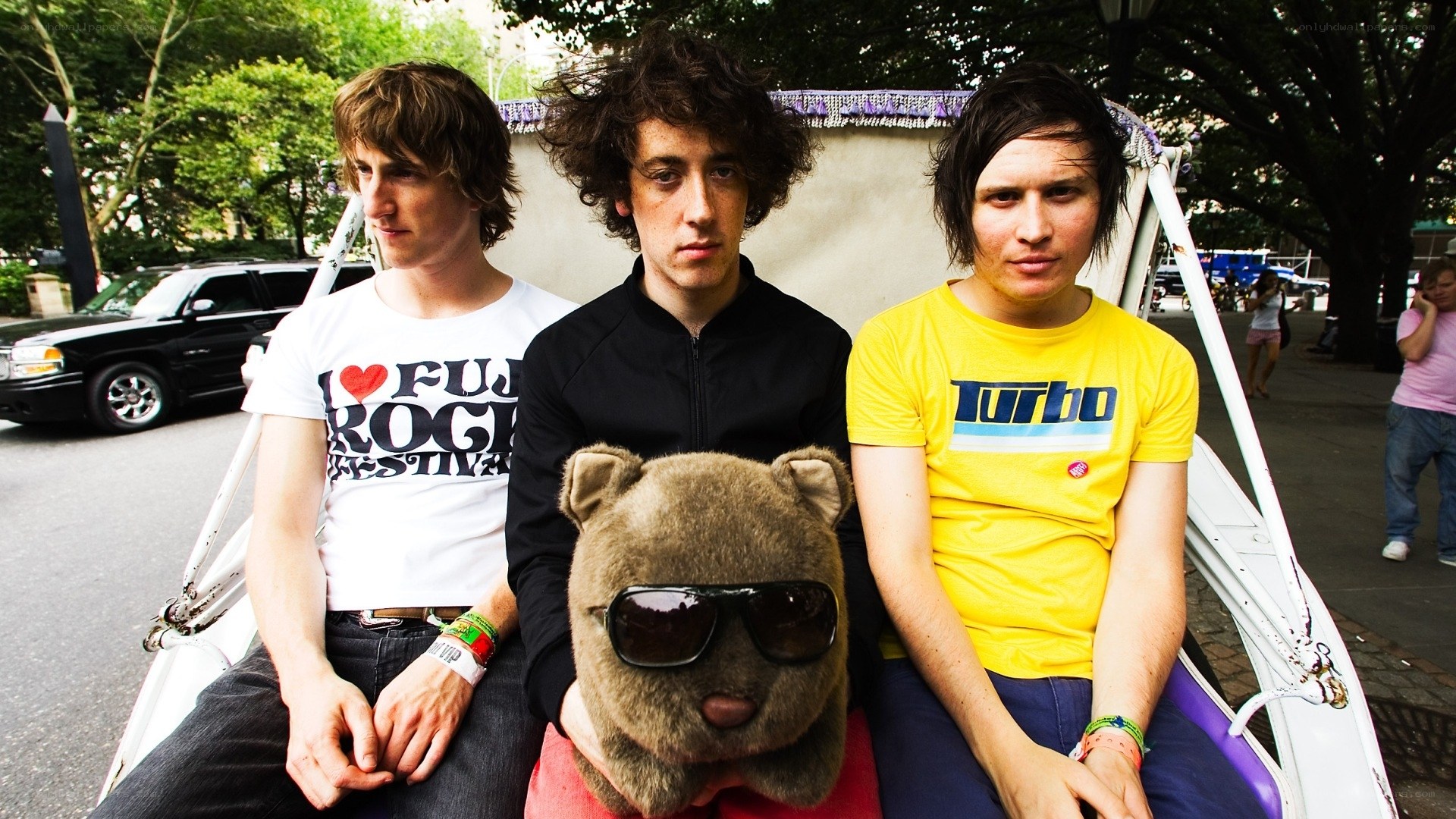band members with stuffed animal