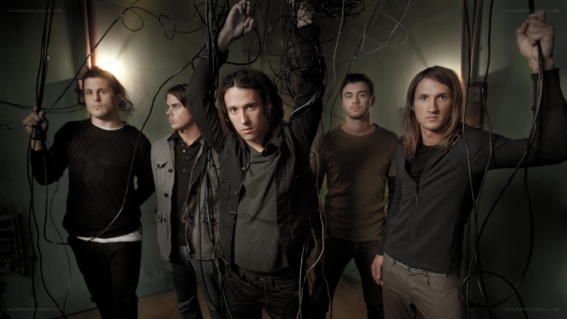 band members with tangled wires