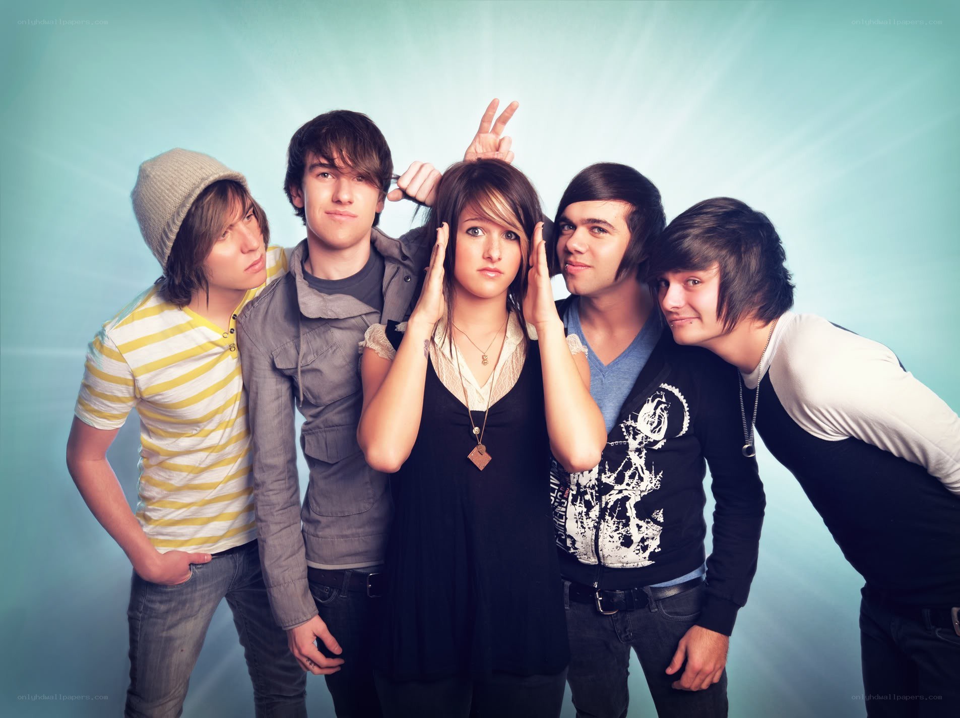 band of five friends posing