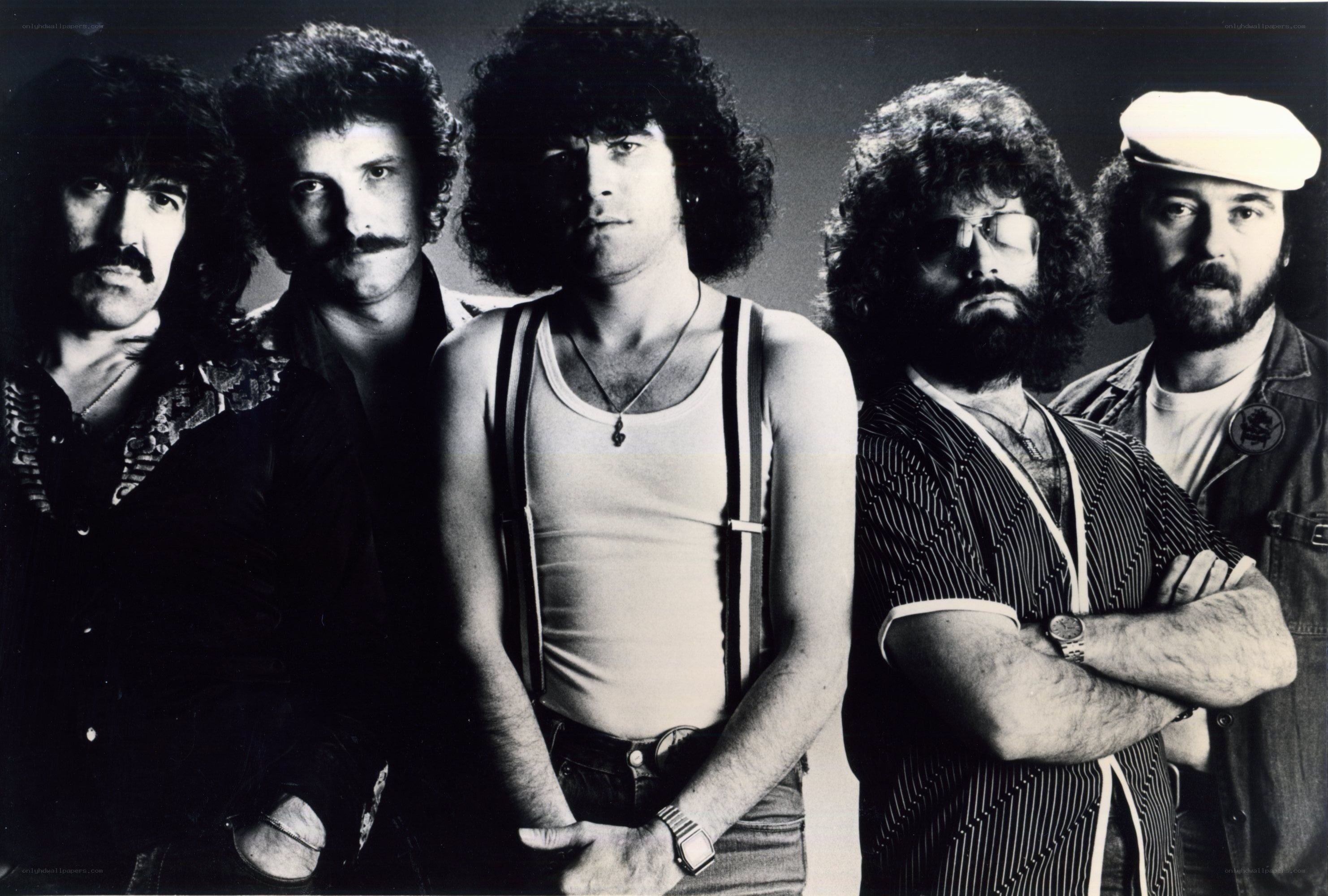 band of five men in 1970s style