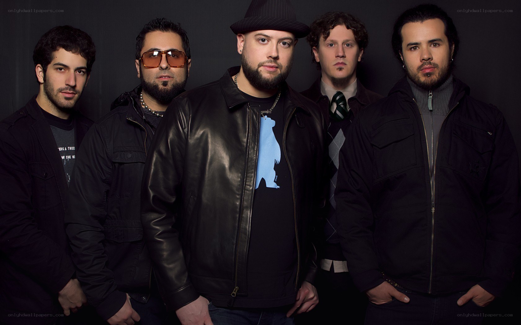 band of five men in dark clothing