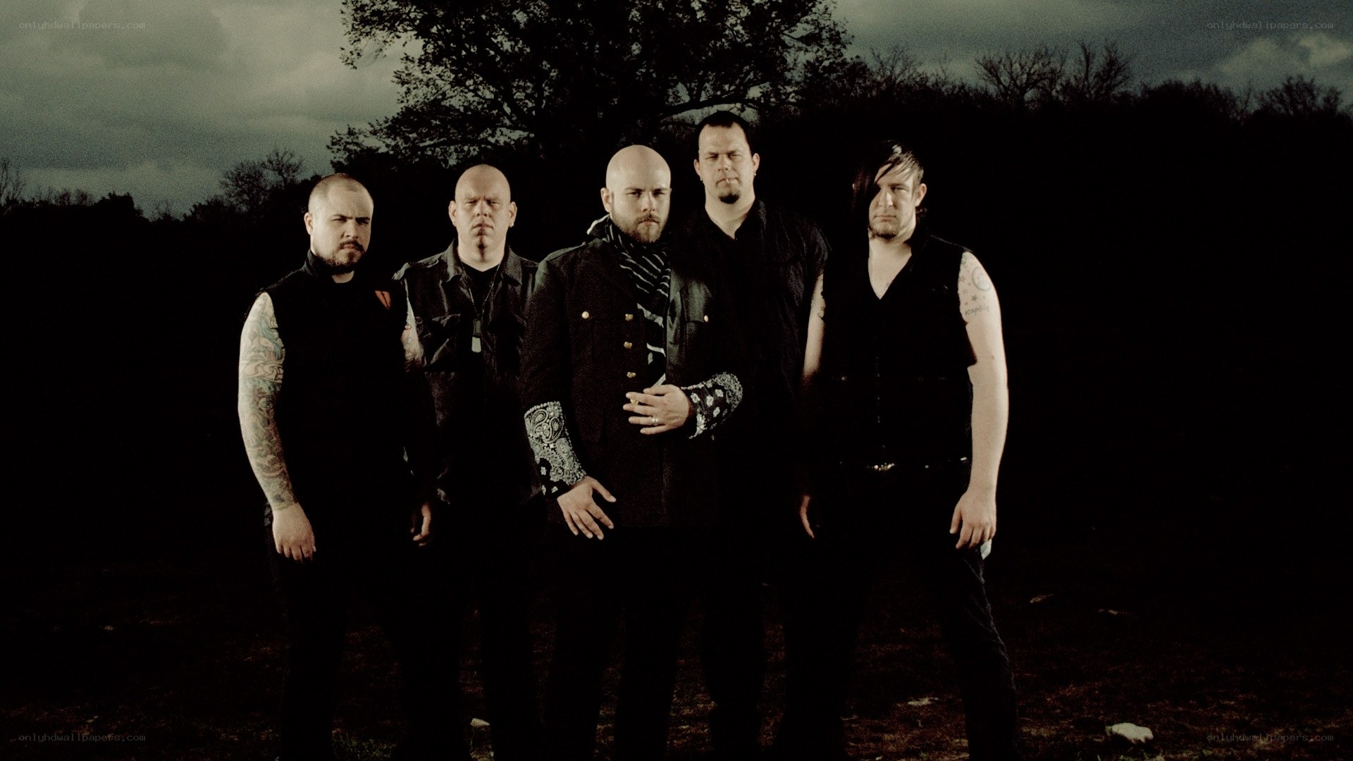 band of five men in dark clothing