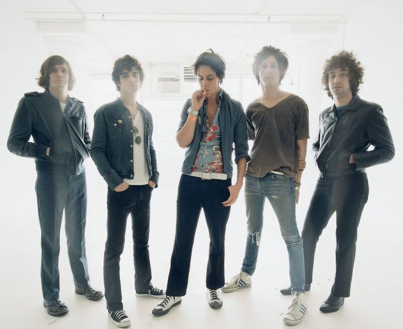 band of five men in studio