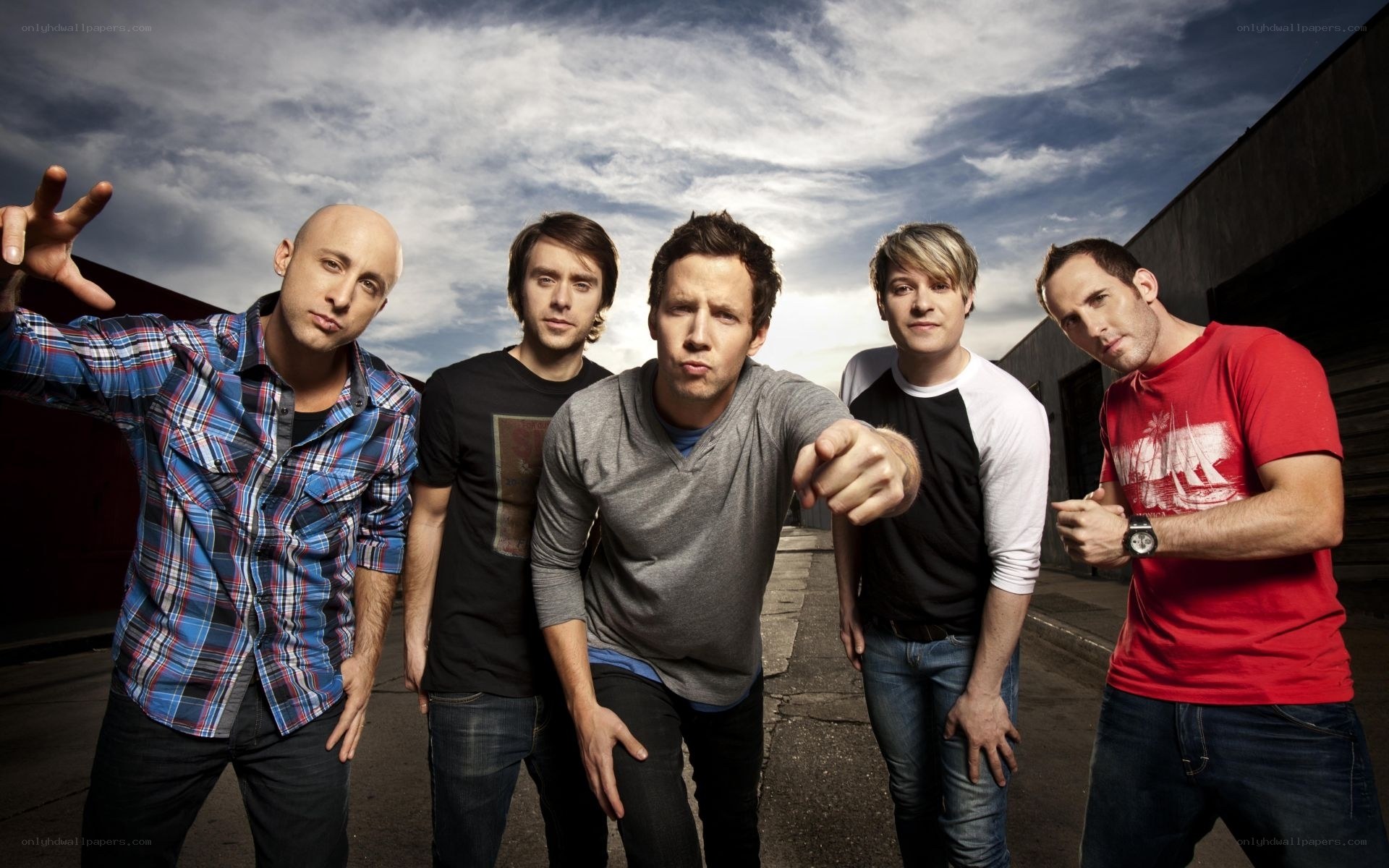 band of five men posing