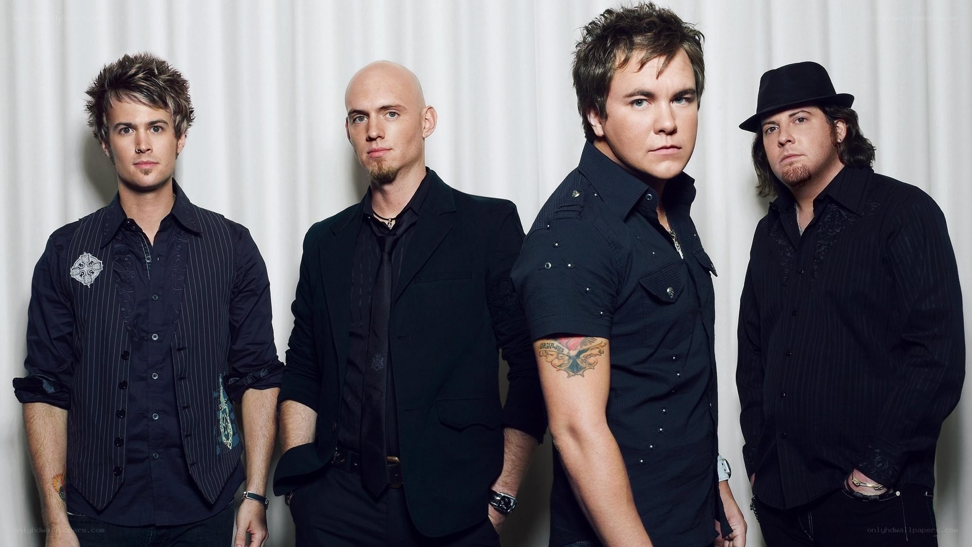 band of four men