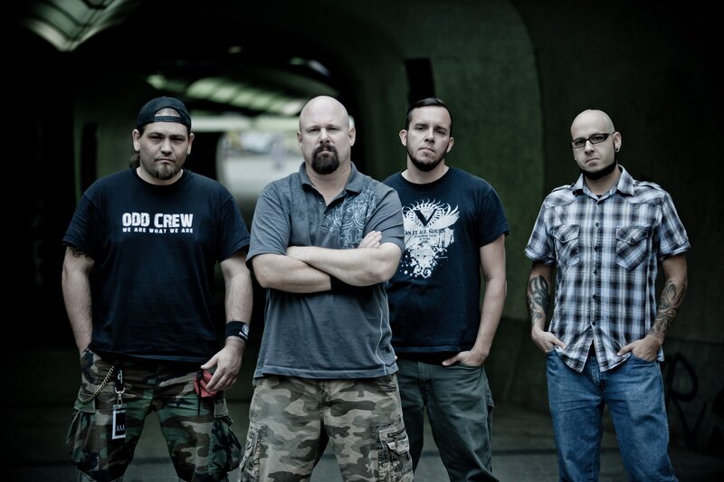 band of four men in urban setting