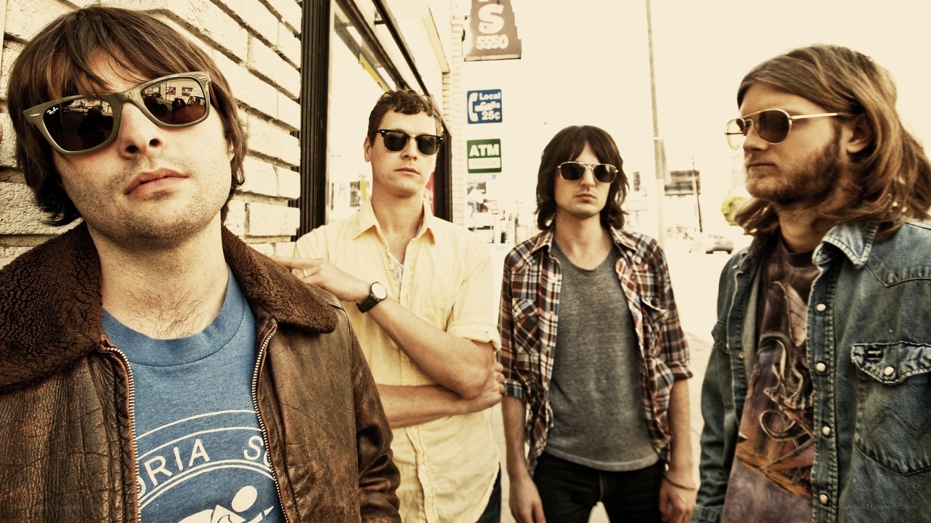 band of four men on street