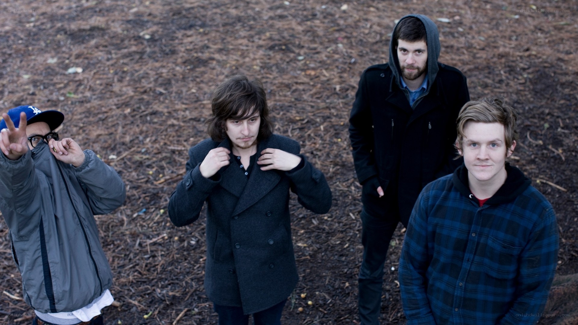 band of four men outdoors