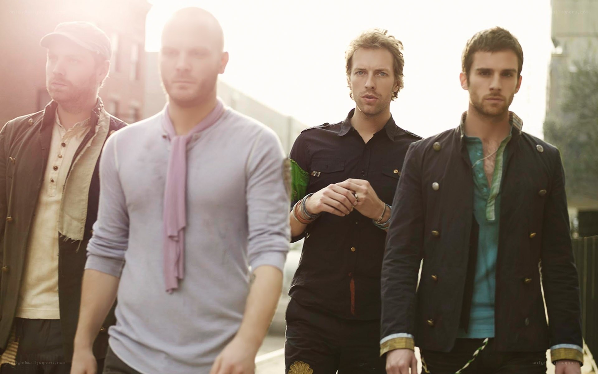 band of four men walking