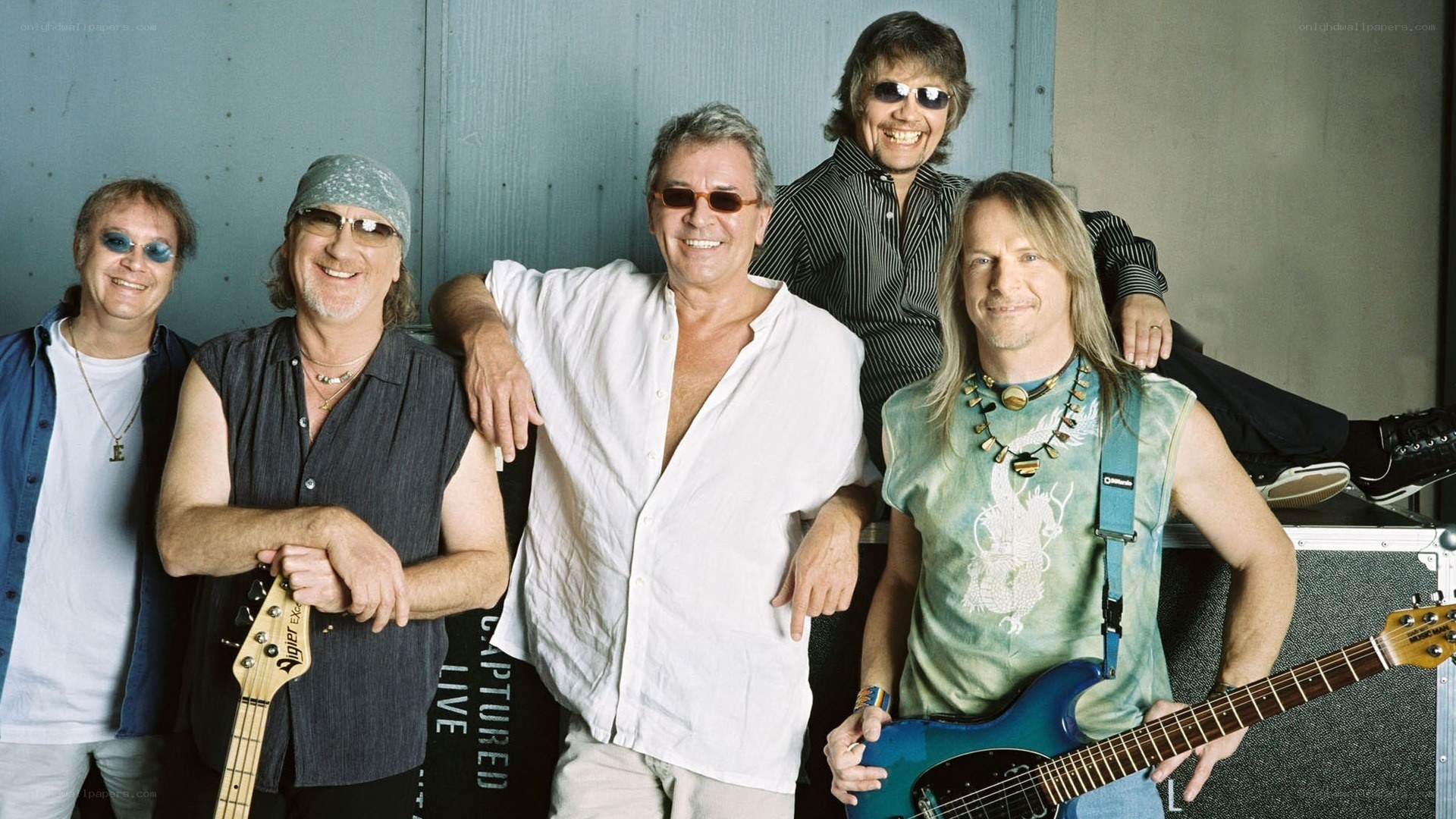 band of musicians posing together