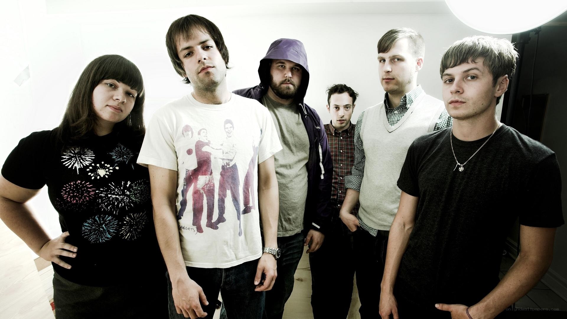 band of six people posing