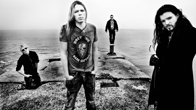band on a pier by the sea