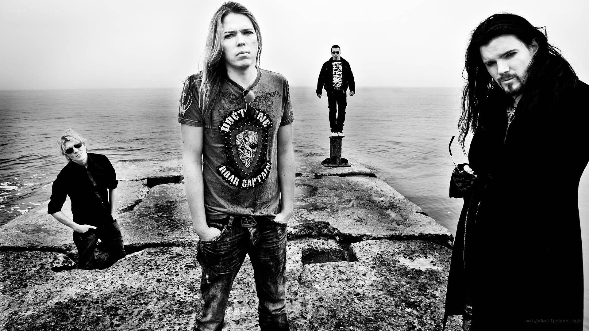 band on a pier by the sea
