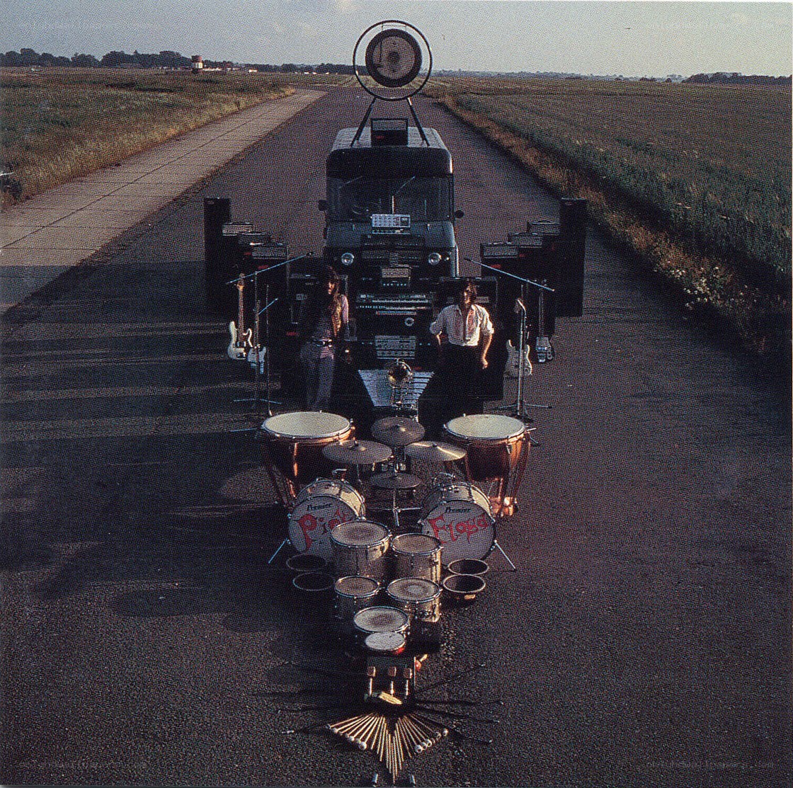 band on a road with instruments