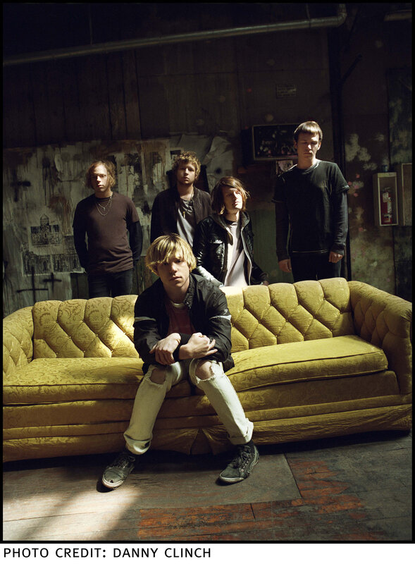 band on a yellow couch