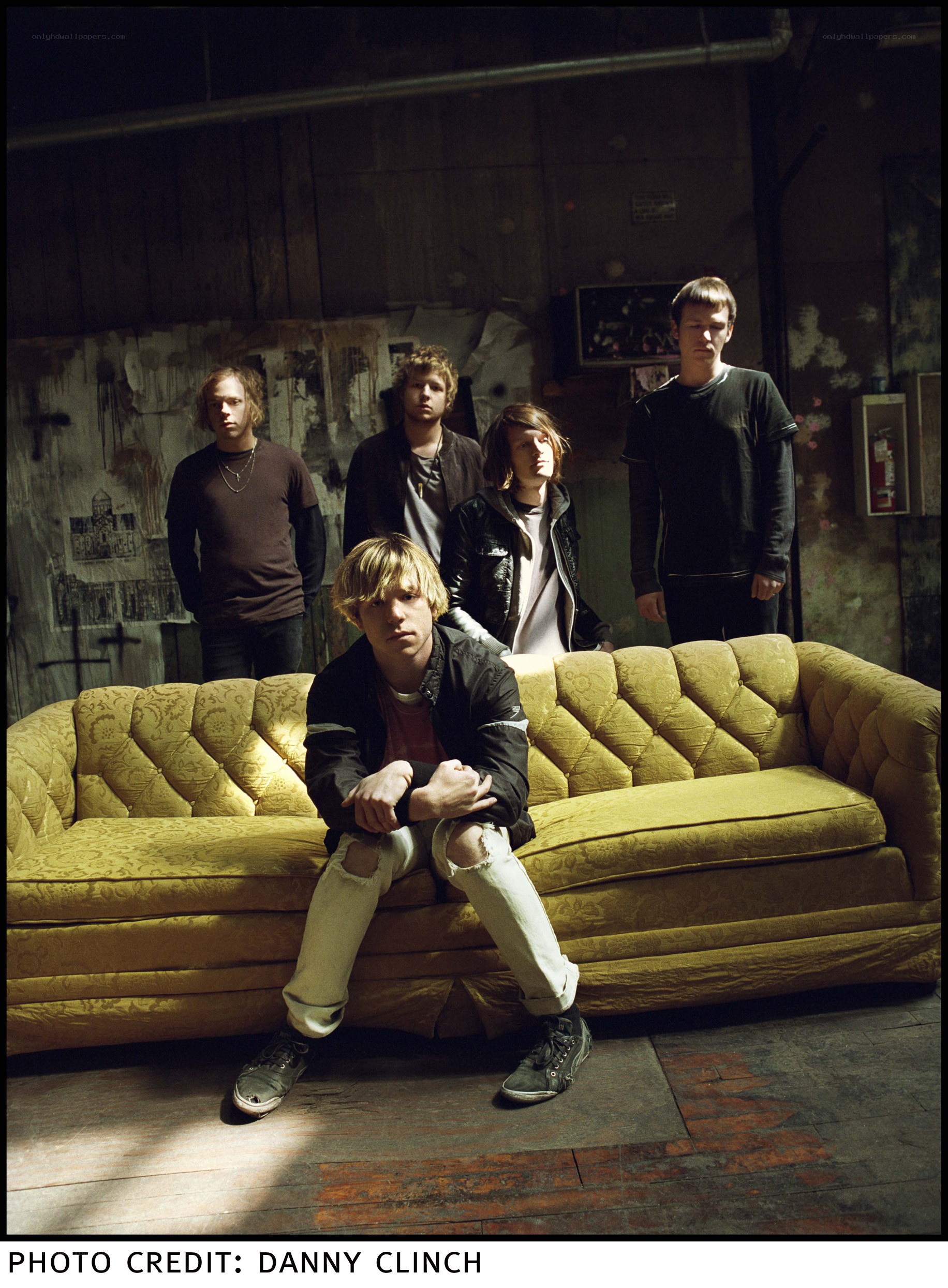 band on a yellow couch
